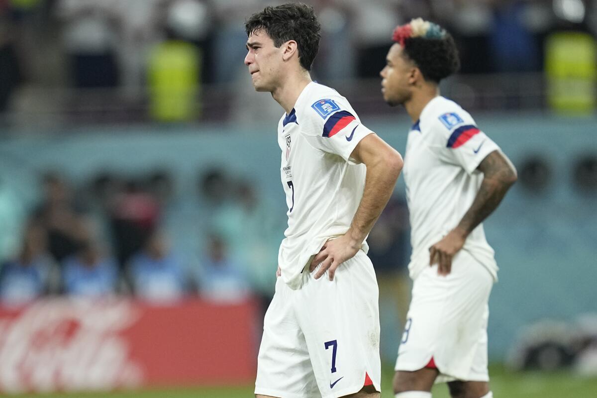 Gio Reyna walks off the field after the U.S. loses to the Netherlands at the World Cup on Dec. 3.