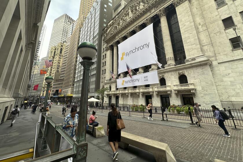 People pass the New York Stock Exchange on Wednesday, July 31, 2024 in New York. Global stocks have advanced and oil prices jumped more than $2 a barrel after Hamas's top political leader died in an air strike.(AP Photo/Peter Morgan)