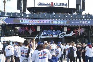 LOS ANGELES, CALIFORNIA - JUNE 03: LGBTQ+ Pride Night signage at the 9th Annual LGBTQ+ Night at Dodger Stadium.