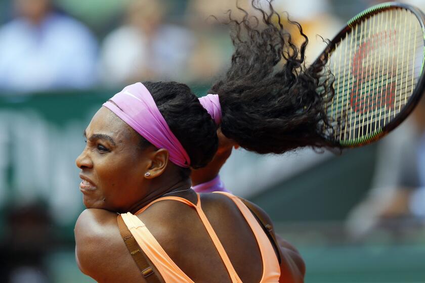 Serena Williams follows through on a backhand during her victory over Sara Errani in the quarterfinals of the French Open on Wednesday in Paris.