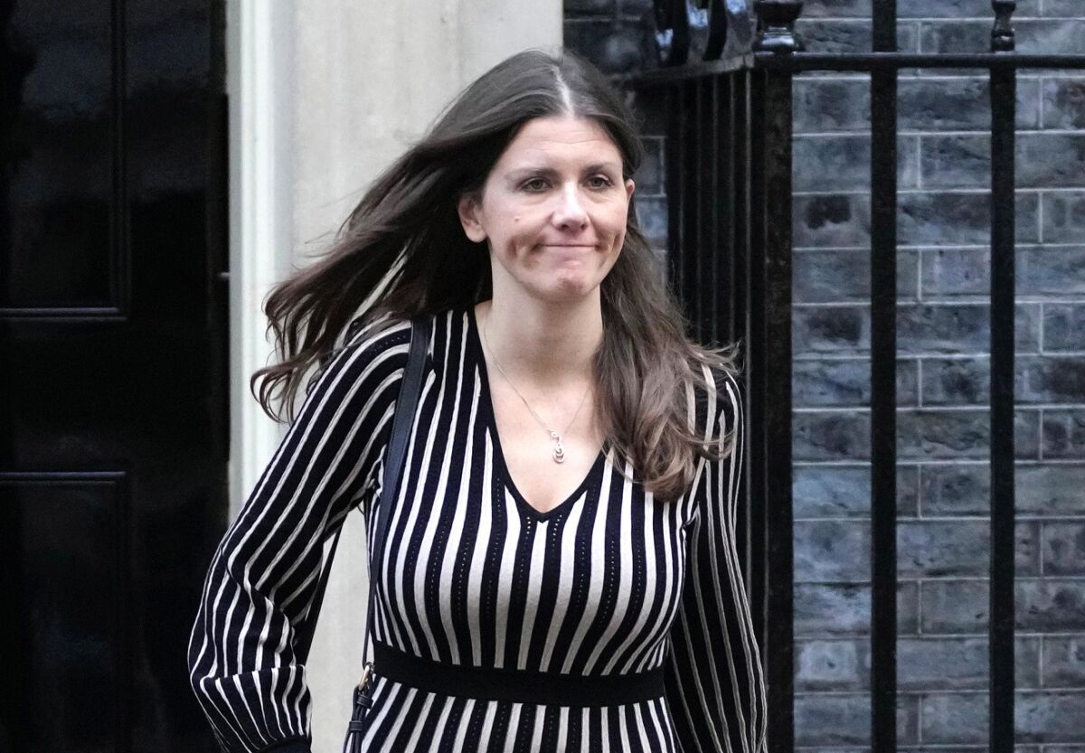FILE - Britain's Secretary of State for Digital, Culture, Media and Sport Michelle Donelan leaves after a cabinet meeting at 10 Downing Street in London, Tuesday, Oct. 18, 2022. The British government has abandoned a plan to force tech firms to remove internet content that is harmful but legal, a proposal that drew strong criticism from lawmakers and civil liberties groups. Digital Secretary Michelle Donelan said the plan has been dropped because it would have created "a quasi-legal category between illegal and legal.” (AP Photo/Kin Cheung, File)