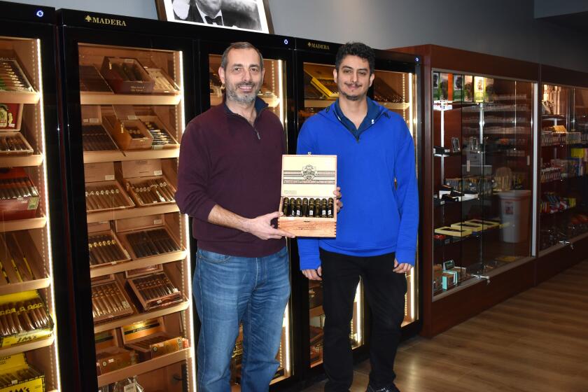 Bashar Haddad and Danny Beiroti are co-owners of Aura Tobacco & Gifts in the Rancho Bernardo Town Center.