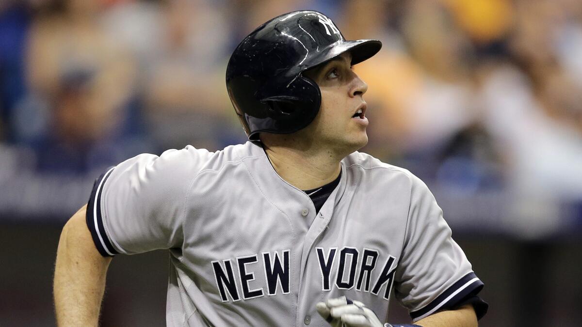 New York Yankees first baseman Mark Teixeira runs after hitting a home run against the Tampa Bay Rays in August. The Arundel product and Mount St. Joseph grad was hitting .217 with 21 homers through Thursday.