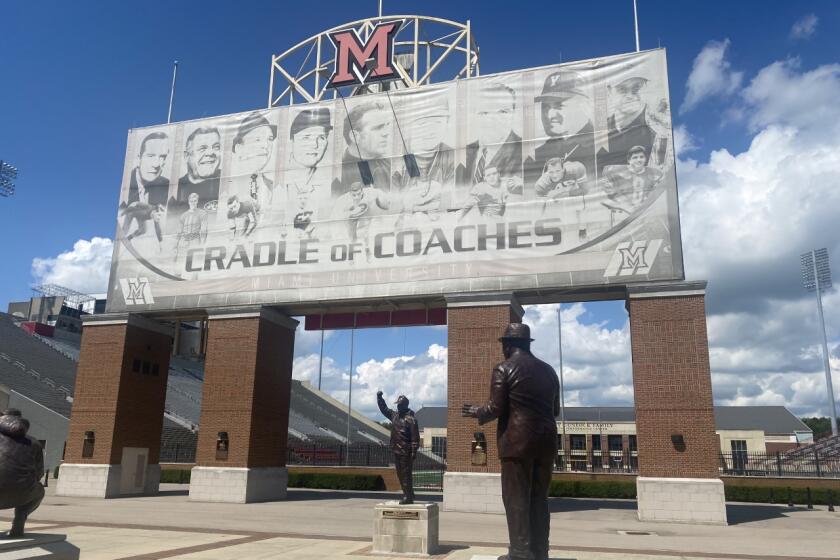 Miami of Ohio University displays statues of it's famous alumni coaches outside its football stadium.
