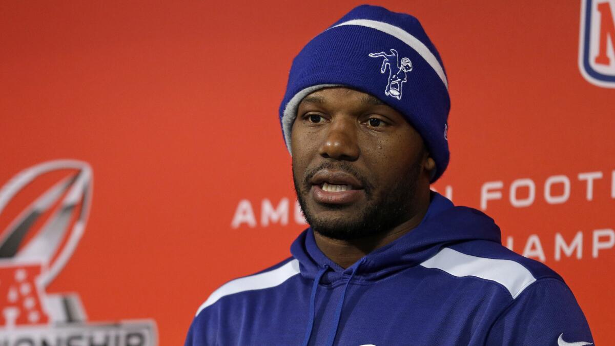 Indianapolis Colts linebacker D'Qwell Jackson, shown speaking at a news conference Jan. 14, was arrested in Washington, D.C., on Tuesday.