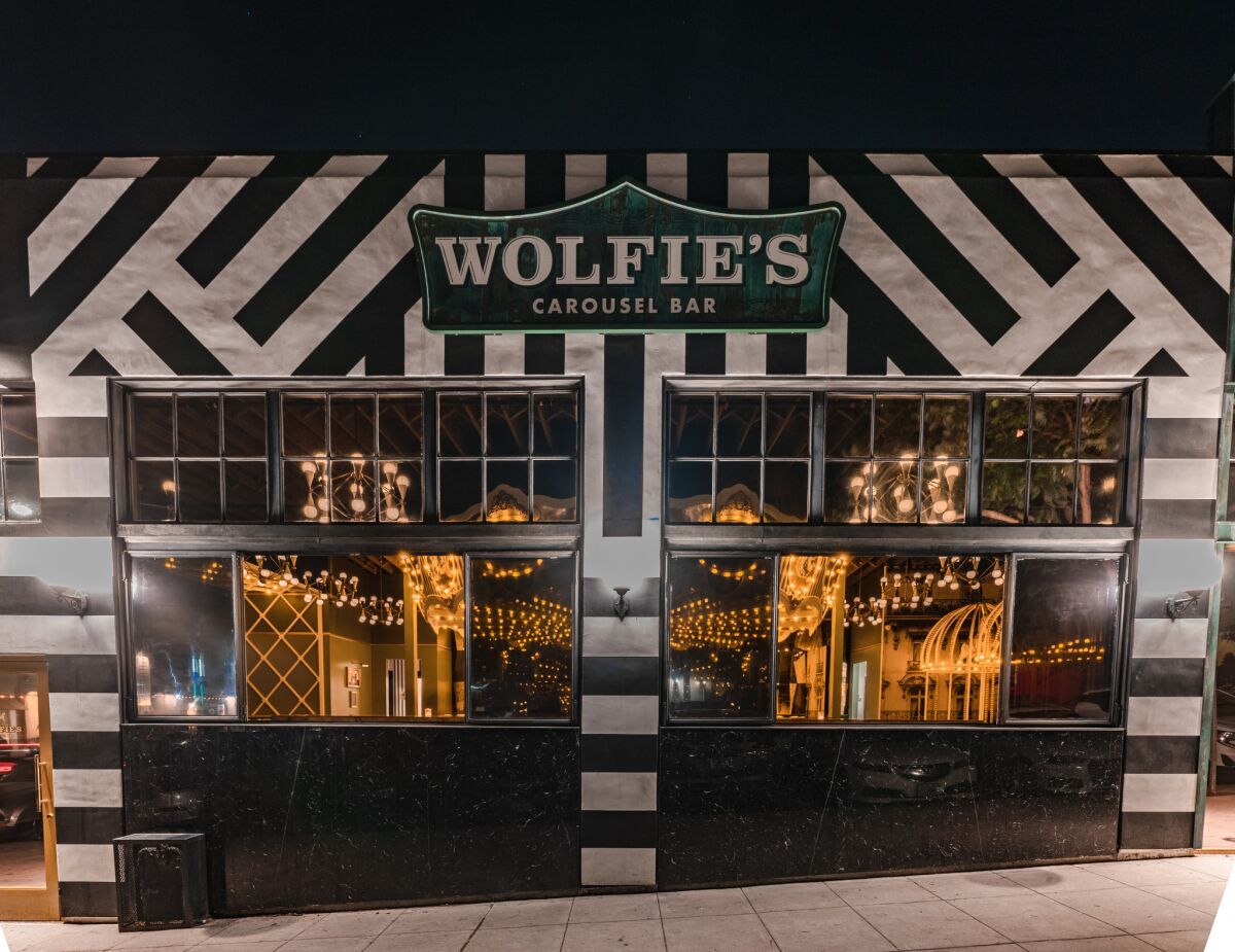 The front entrance of Wolfie's Carousel Bar in North Little Italy.