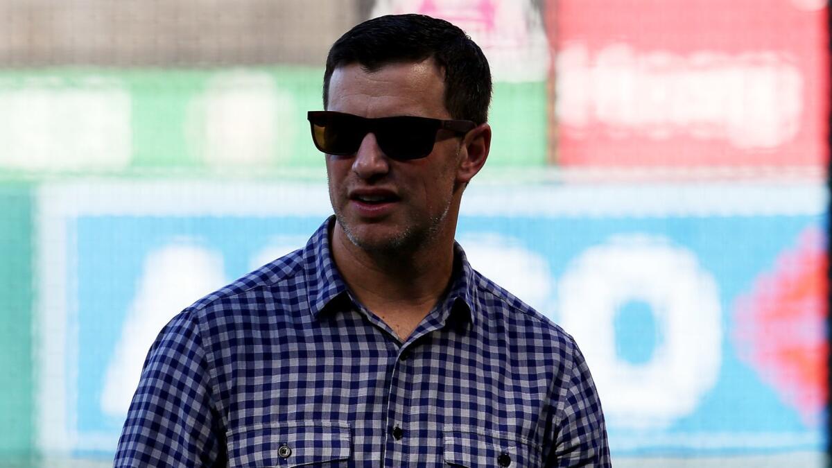 Andrew Friedman, the Dodgers’ president of baseball operations, watches the team warm up before a game on June 28.