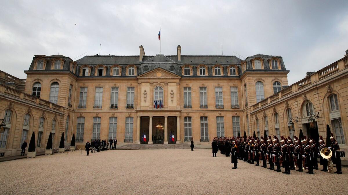 Republican guards line up in the courtyard of the presidential Elysee Palace in Paris on April 14. The two-round presidential election is set for April 23 and May 7.