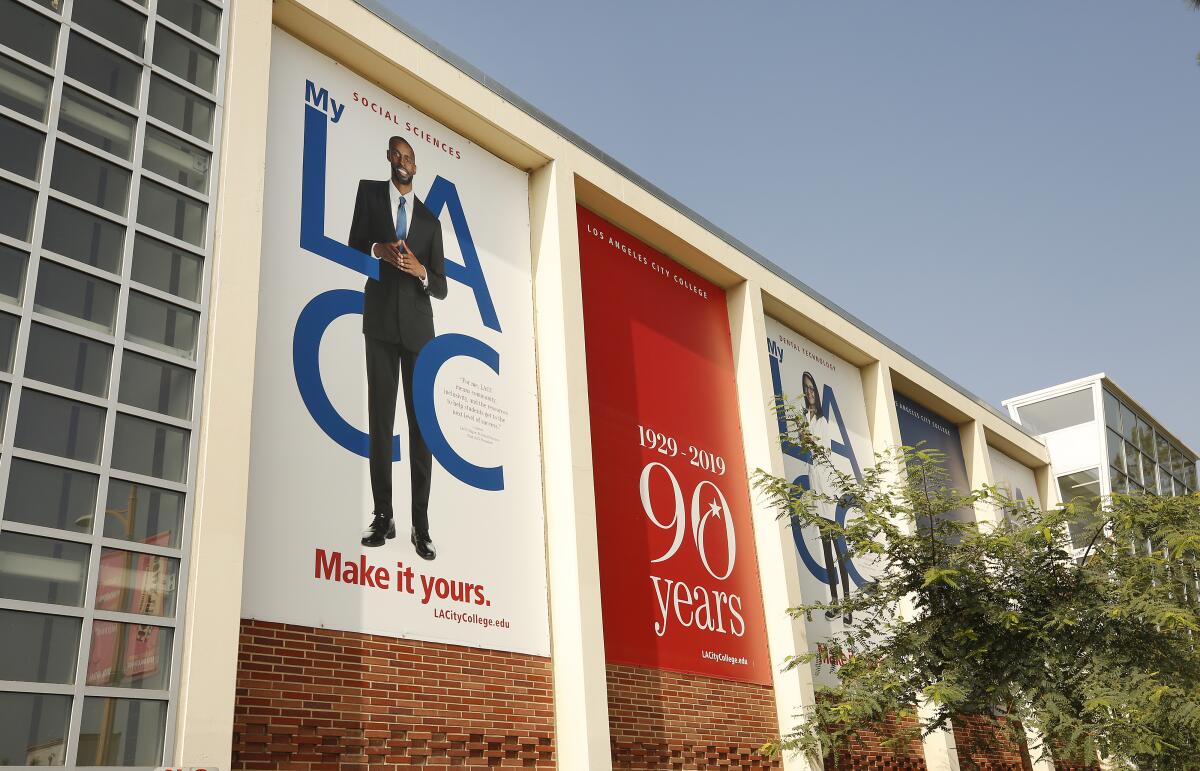 The exterior of Los Angeles City College has a sign, "LACC: Make it yours."