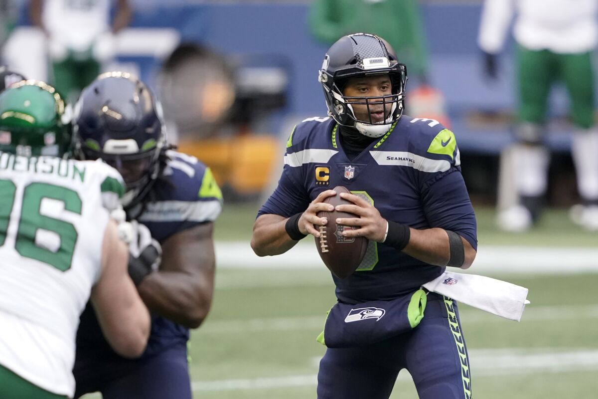 Seattle Seahawks quarterback Russell Wilson looks to pass against the New York Jets.