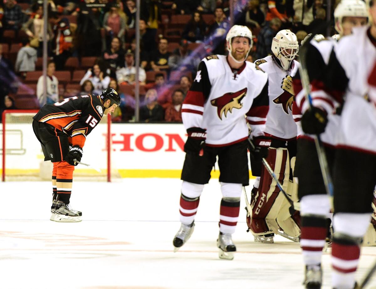 Ducks forward Ryan Getzlaf reacts after his giveaway at center ice resulted in an overtime goal by Mikkel Boedker to give the Coyotes a 4-3 win.