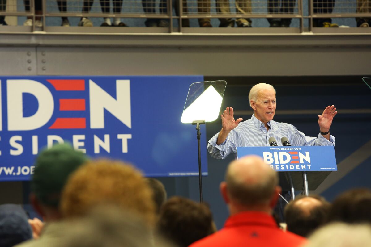 Presidential candidate Joe Biden speaks at a town hall in Manchester, N.H.