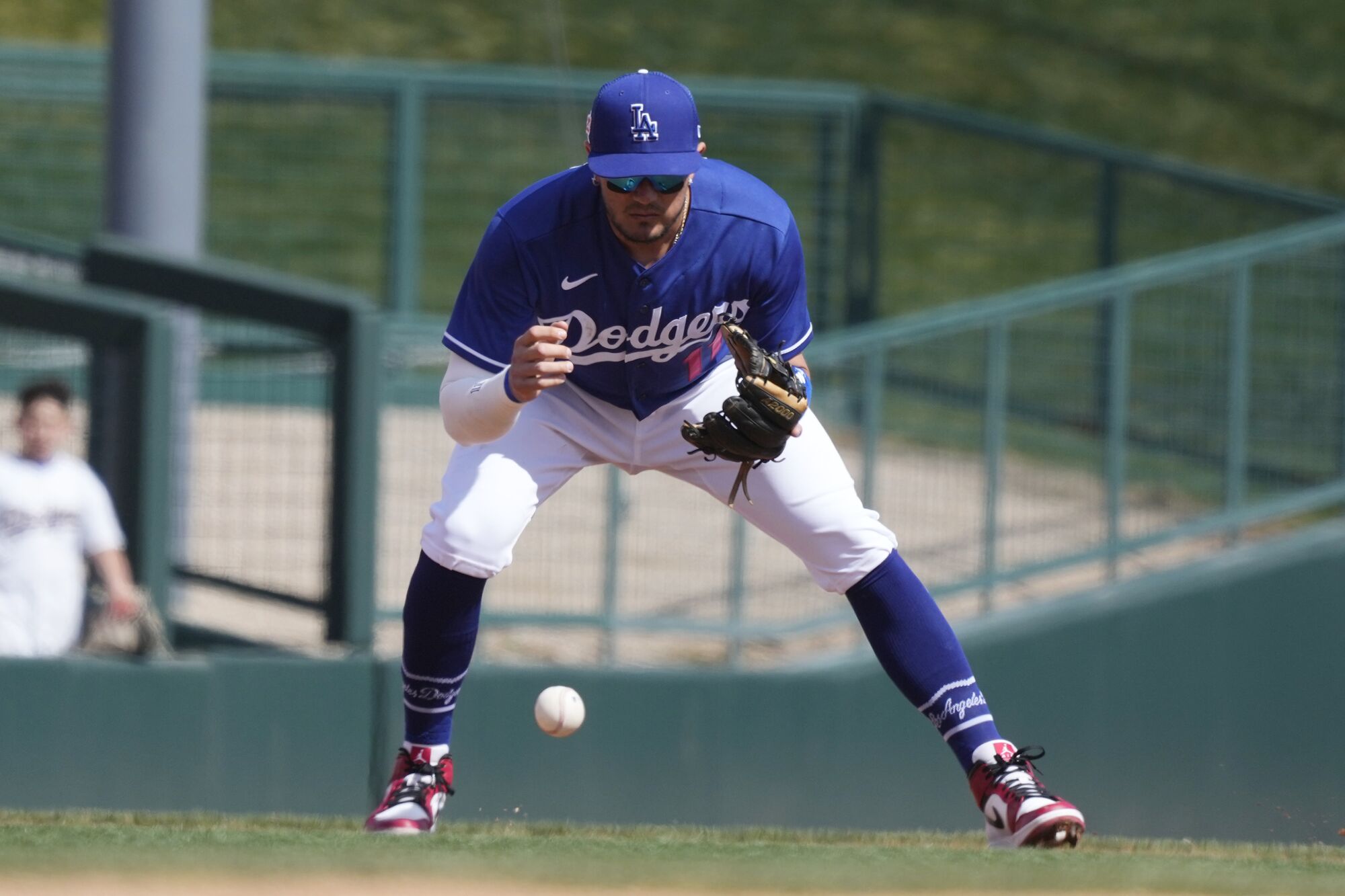 Miguel Rojas fields a ball at shortstop.