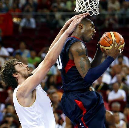 Can Kobe Bryant feel the pressure from Spain's Pau Gasol? Back in the States, the two are teammates for the NBA Lakers.
