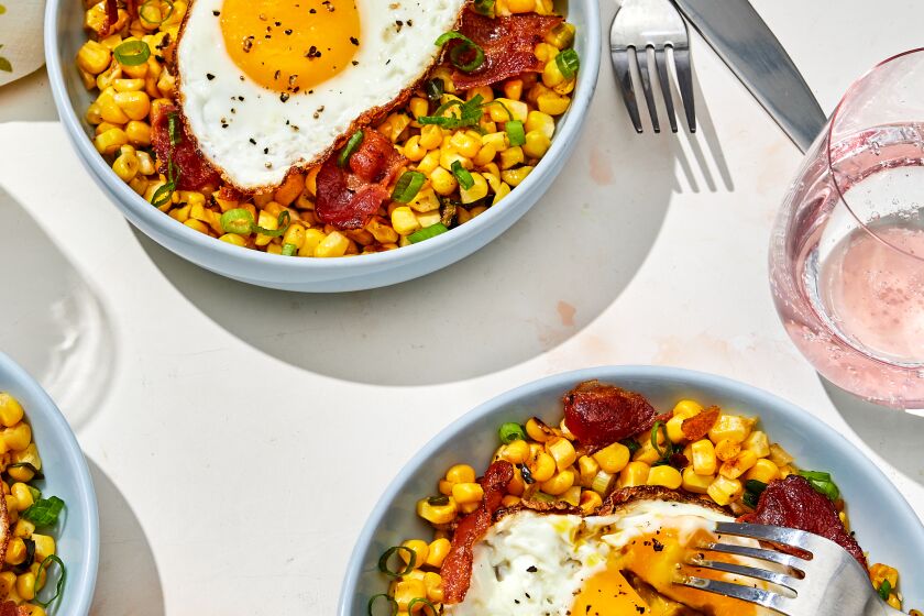 LOS ANGELES - THURSDAY, July 25, 2019: Seared Corn with Bacon and Egg. Food Stylist by Genevieve Ko / Julie Giuffrida and propped by Nidia Cueva at Proplink Tabletop Studio in downtown Los Angeles on Thursday, July 25, 2019. (Leslie Grow / For the Times)