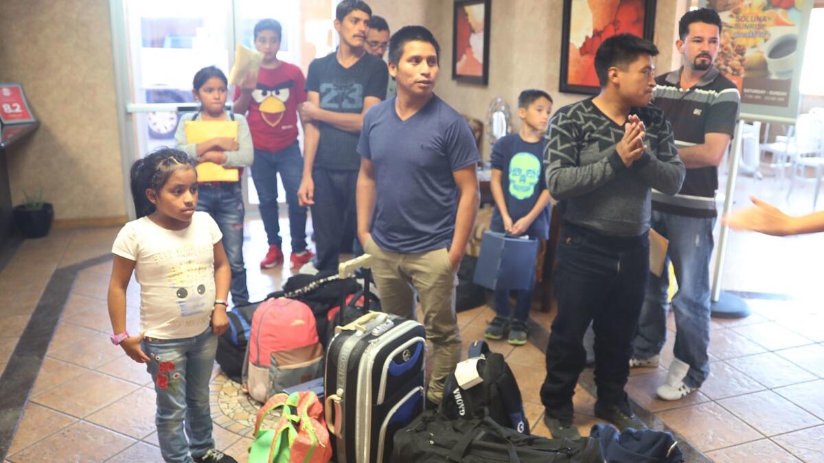 Parents and children arrive at a shelter in El Paso after being reunited. The families were separated when they tried to cross the border into the United States.
