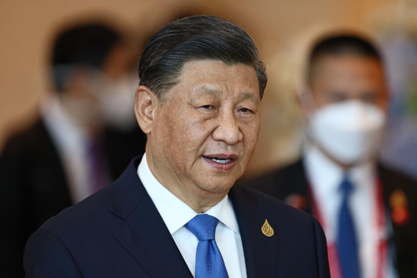 FILE - China's President Xi Jinping arrives to attend the APEC Economic Leaders Meeting during the Asia-Pacific Economic Cooperation, APEC summit, Nov. 19, 2022, in Bangkok, Thailand. China’s ruling Communist Party is calling for beefed-up national security measures, highlighting the risks posed by advances in artificial intelligence. A meeting headed by party leader and President Xi on Tuesday, May 30, 2023, urged “dedicated efforts to safeguard political security and improve the security governance of internet data and artificial intelligence," the official Xinhua News Agency said. (Jack Taylor/Pool Photo via AP, File)