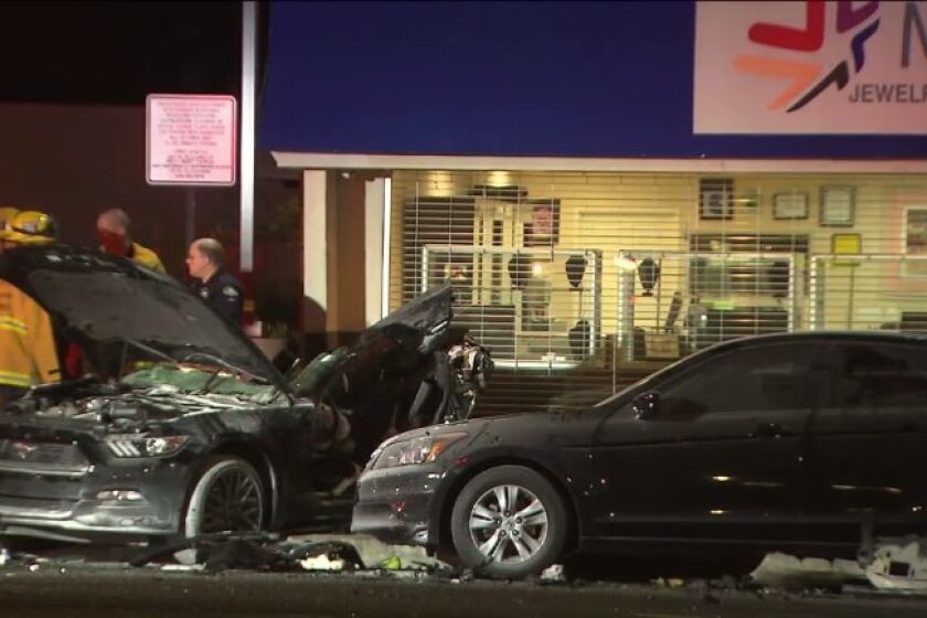 Officials investigate a deadly multi-vehicle crash Saturday night in Woodland Hills.
