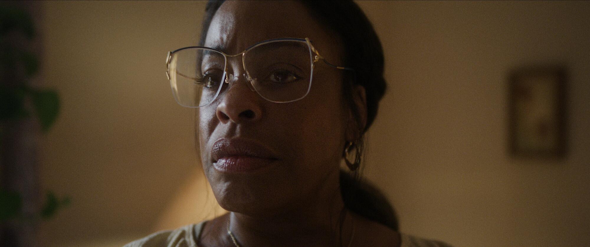 Niecy Nash-Betts wears large eyeglasses and has her hair pulled back for "Dahmer -- Monster: The Jeffrey Dahmer Story."