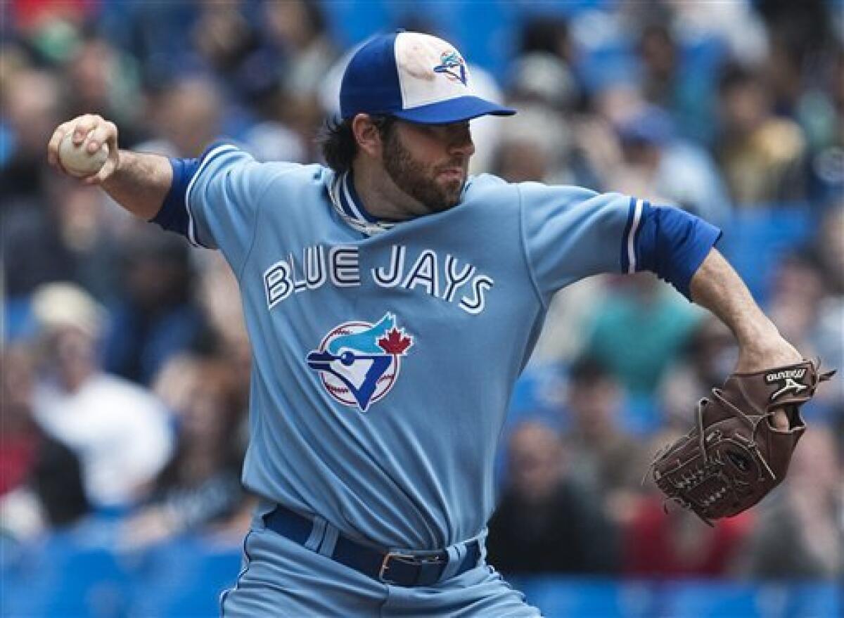 Edwin Encarnacion throws first pitch for Blue Jays in Game 1