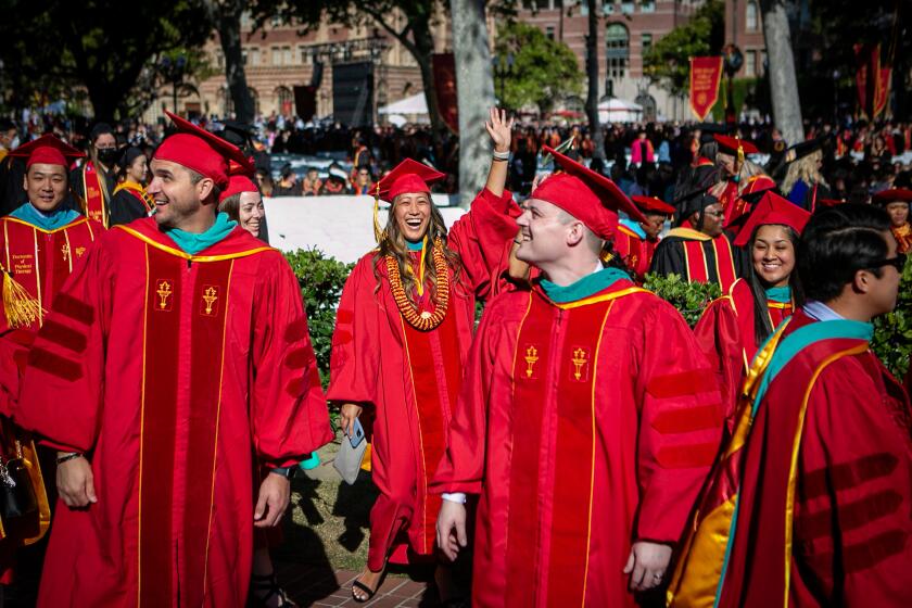 LOS ANGELES, CA - MAY 13: Graduates enter The University of Southern California's 2022 commencement ceremony on Friday, May 13, 2022 in Los Angeles, CA. (Jason Armond / Los Angeles Times)