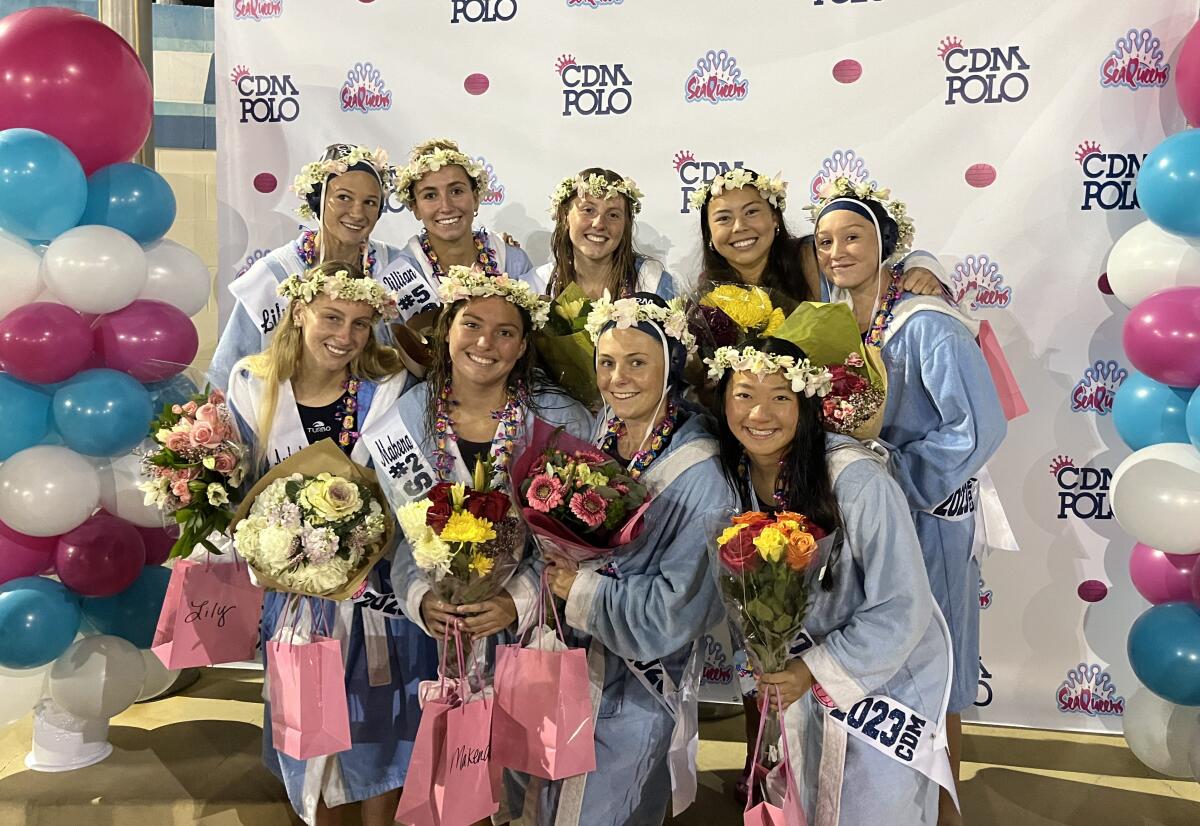 Members of the CdM girls' water polo senior class gather for a group photo.