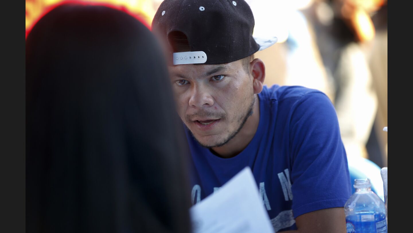 Noel Lopez from Honduras checked in with the IOM (International Organization for Migration) staff for assistance in returning back to his hoe country. Lopez was among the thousands that recently arrived to Tijuana, Mexico after traveling for more than a month with Central American migrant caravan.