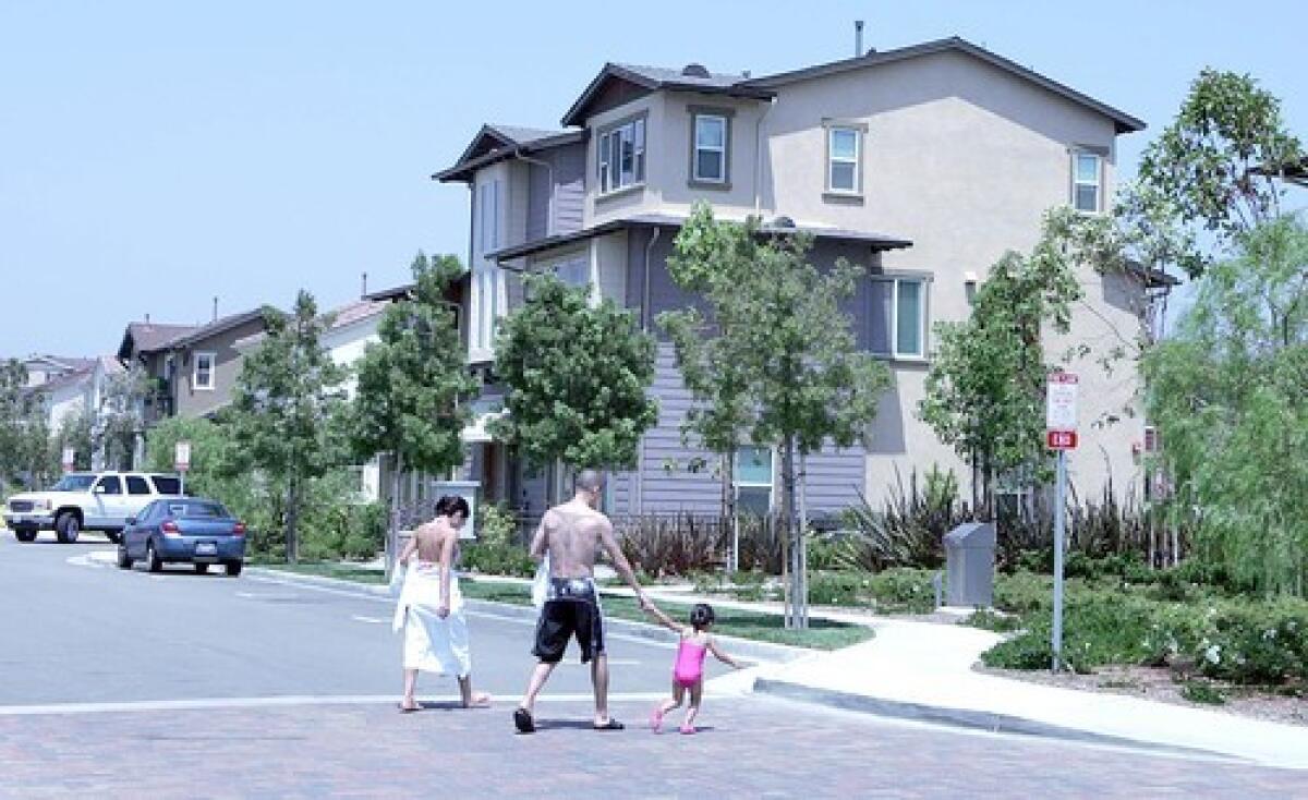 Tustin Field attracts families with its playgrounds and community pools. The two phases of the development, 376 town houses and clustered homes and 189 larger houses, are built on a former Marine base, which closed in 1999.