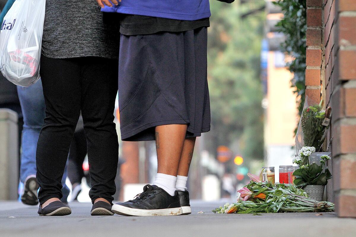 A makeshift memorial near the site where 52-year-old Rodolfo Tan of Burbank was killed. Tan was struck by a minivan that crashed into a Burbank bus stop.