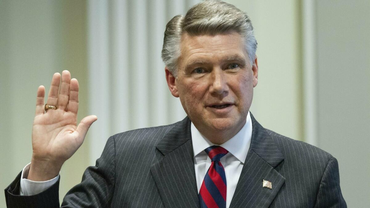 Mark Harris, the Republican candidate in North Carolina's 9th Congressional District race, prepares to testify before the state election board.