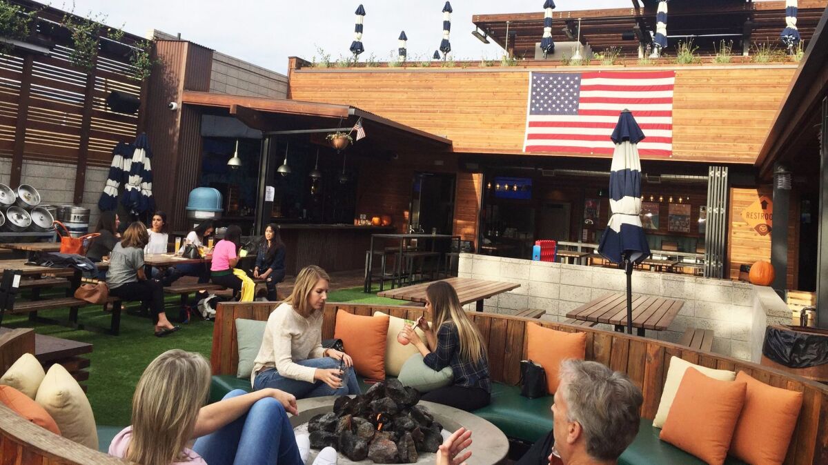 The central courtyard at Park 101, a four-in-one dining and drinking destination that opened July 4, 2017, in Carlsbad Village.
