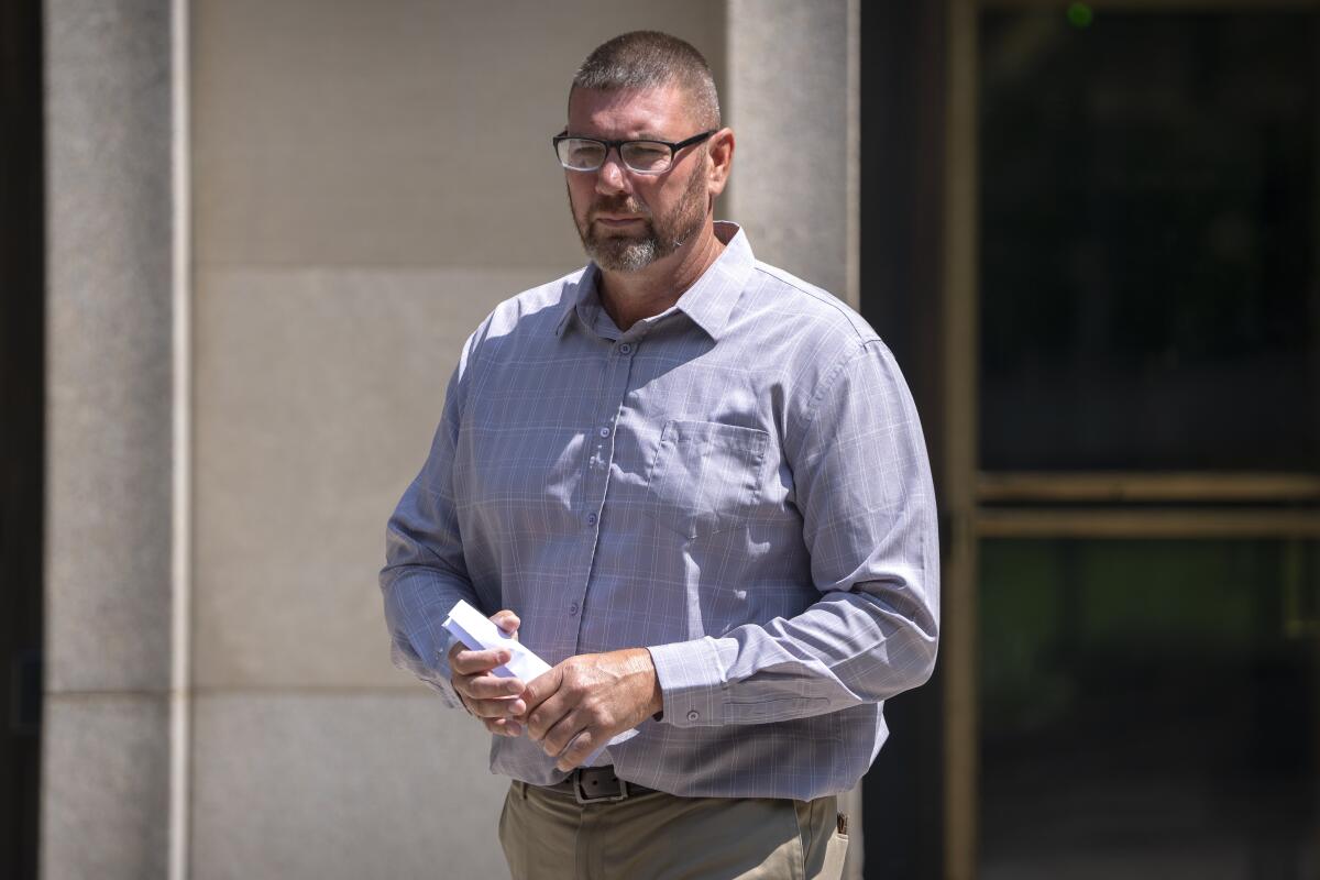 Michael Sparks walks out of court.