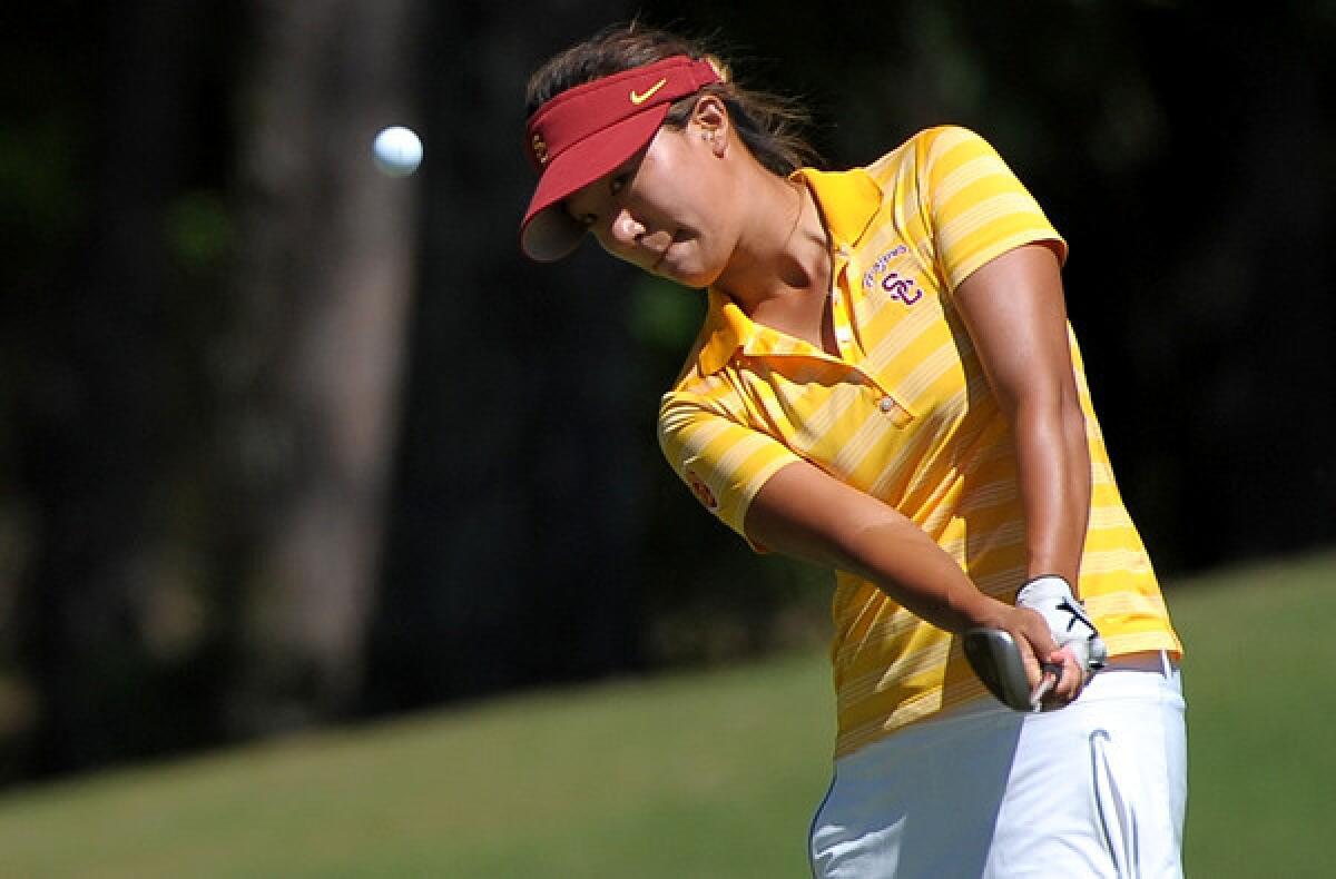 USC's Annie Park chips onto the seventh green during the NCAA women's golf championships on Friday in Athens, Ga. Park won medalist honors for the tournament.