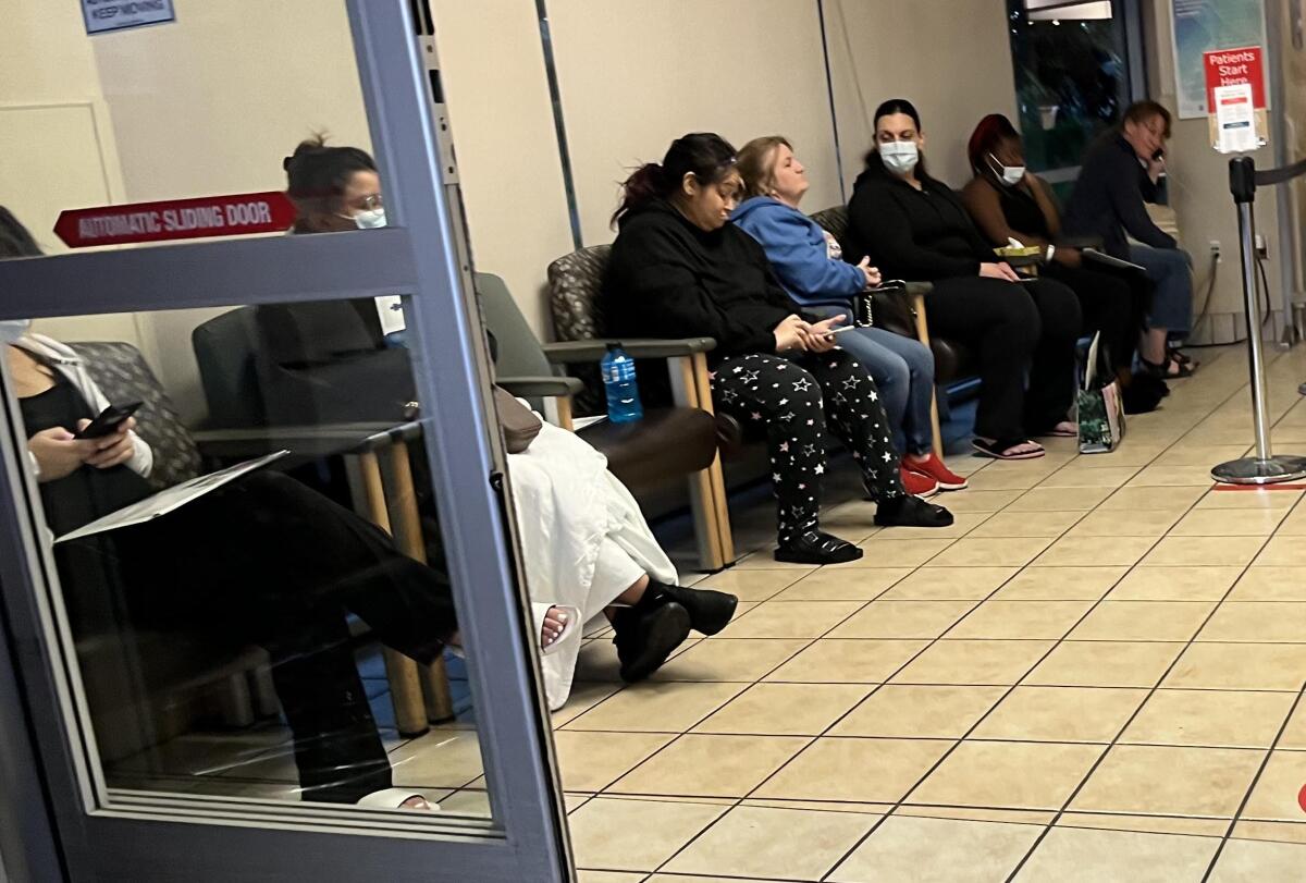Patients wait to be seen at the emergency room at Saint Agnes Medical Center in Fresno last May.