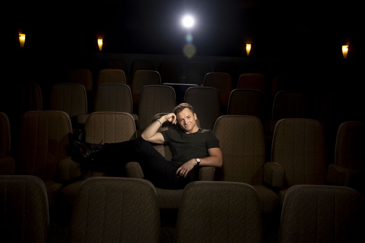 "I know that the only thing that’s unforgivable with Elton is being beige and bland," Taron Egerton says of knowing that the singer was watching dailies of his portrayal.