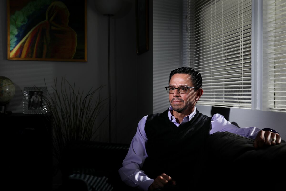 Adan Ortega sits in his office in Fullerton