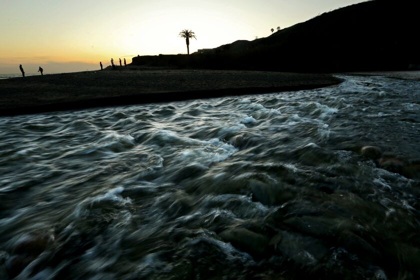 MALIBU, CALIF. - MAR. 27, 2023. Topanga Creek flows into the Pacific Ocean in Malibu. A recent series of storms has benefited the creeks and lagoons of Malibu as runoff has reshaped and revitalized natural streams along the coast. (Luis Sinco / Los Angeles Times)