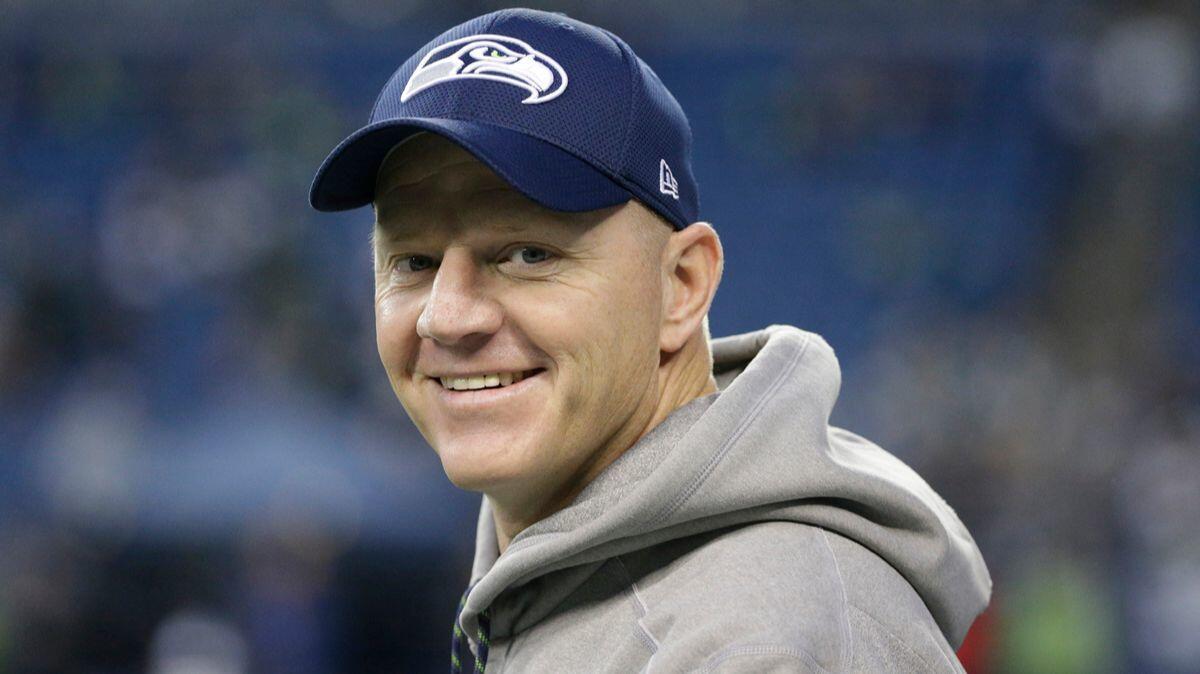 Seattle Seahawks offensive coordinator Darrell Bevell walks on the field before a game against the Philadelphia Eagles on Dec. 3, 2017.