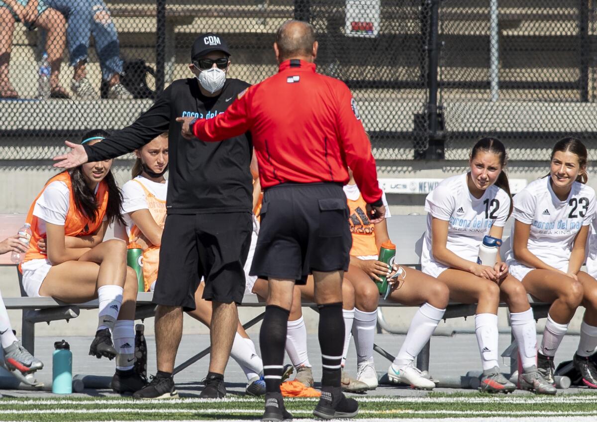 Corona del Mar's head coach Bryan Middleton discusses two yellow cards given by the referee, who chose not to give his name.