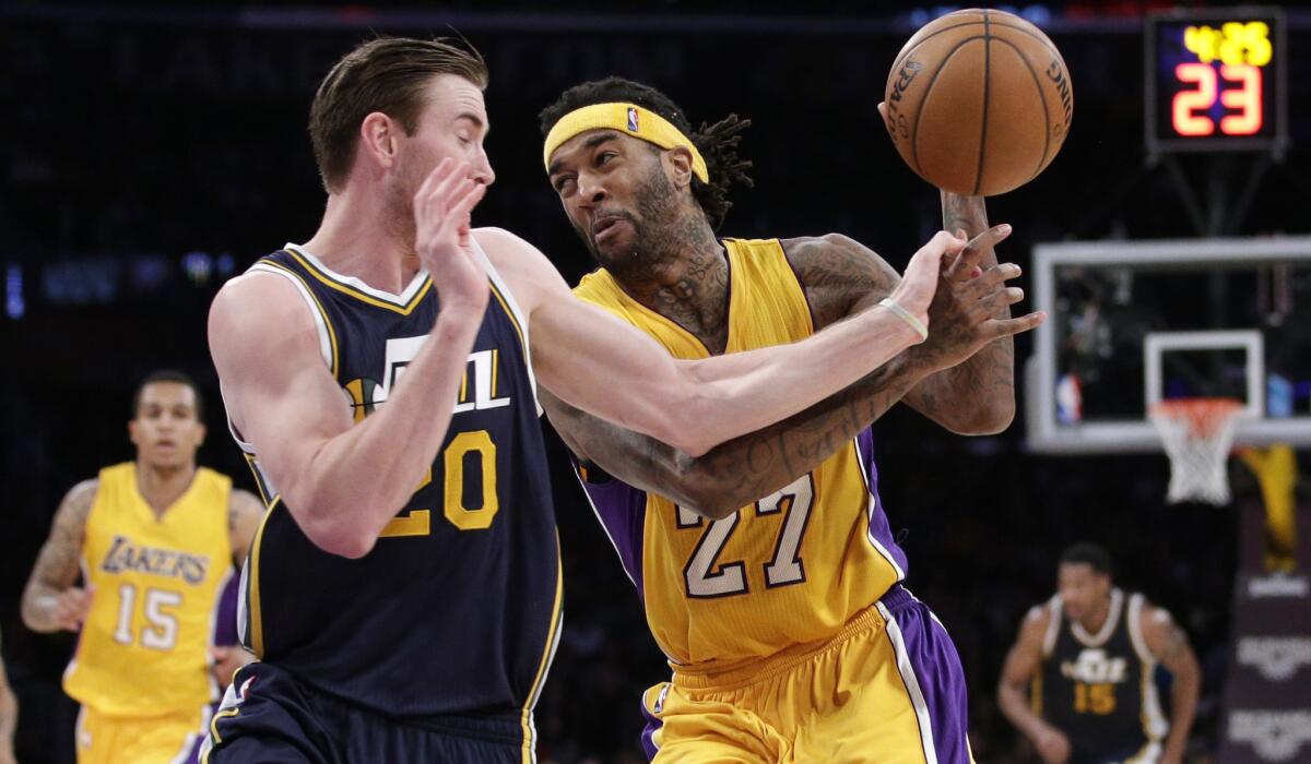 Jazz forward Gordon Hayward tries to steal the ball from Lakers center Jordan Hill in the second half.