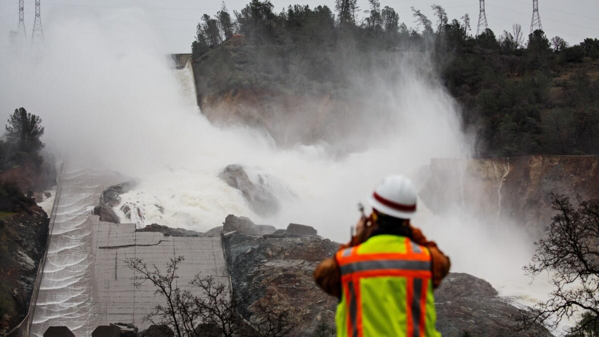 The California Department of Water Resources released water from the Oroville Dam's main spillway on Tuesday for the first time since water eroded the structure, pictured in this file photo, and forced evacuations in 2017.