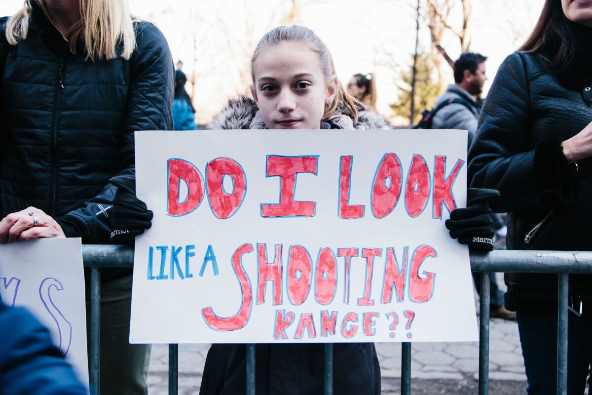 NEW YORK: A girl holds a sign during the March for Our Lives event in Manhattan.