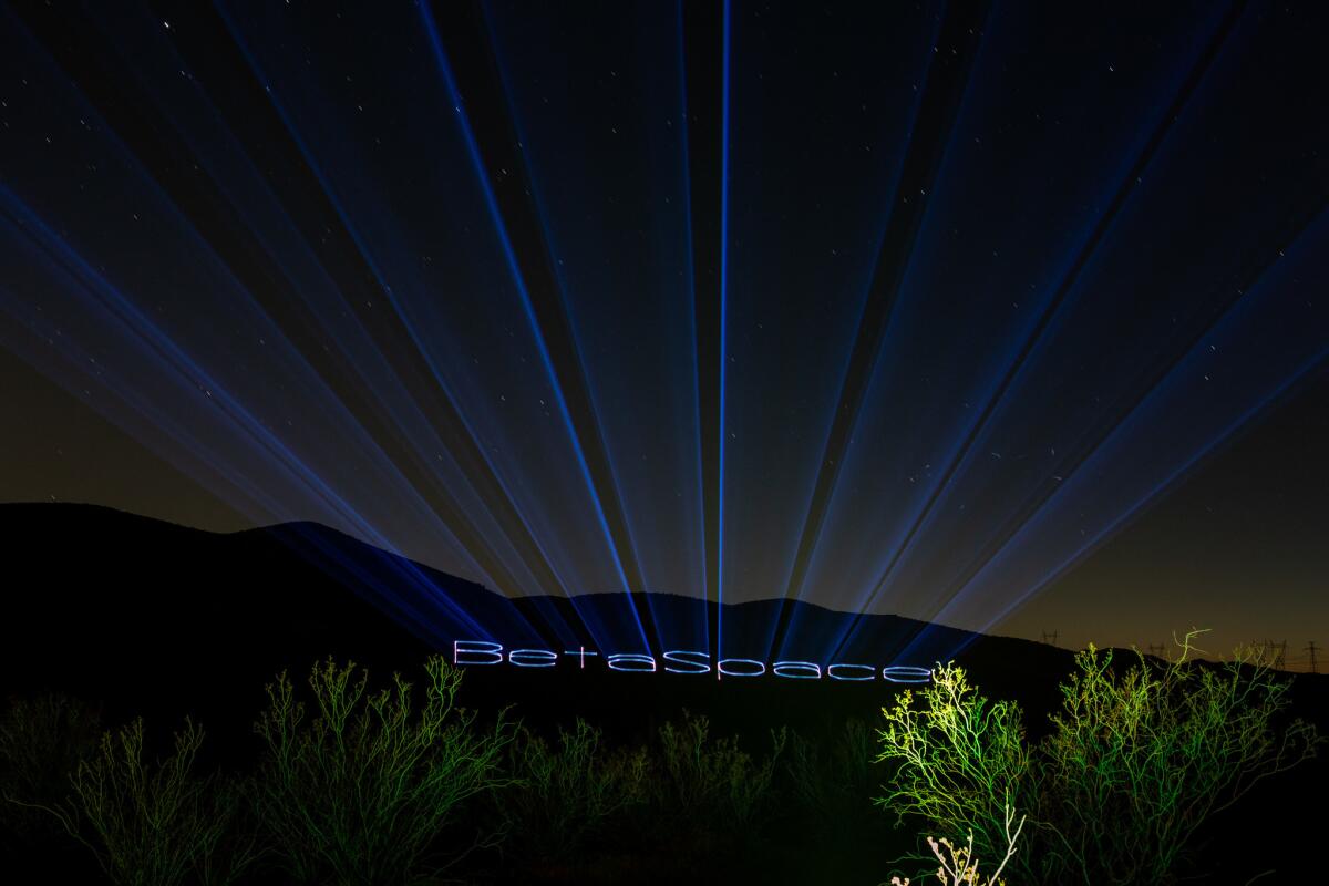 Betaspace is projected on the unmistakably Mars-esque hills in the Mojave Desert.