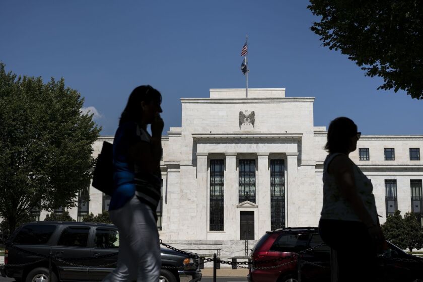 A view of the Federal Reserve building in Washington, DC, on Sept. 17. The Fed held its key interest rate locked at zero on Thursday, pointing to the downturn in the global economy even as US growth remains steady.