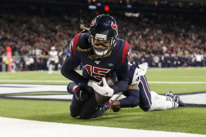 HOUSTON, TX - DECEMBER 01: Will Fuller #15 of the Houston Texans cannot make the reception in the end zone in the second half against the New England Patriots at NRG Stadium on December 1, 2019 in Houston, Texas. (Photo by Tim Warner/Getty Images)