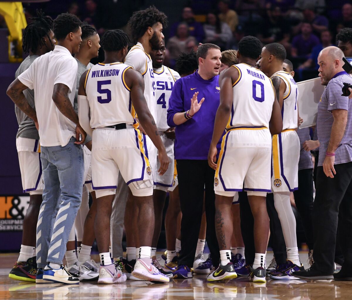 LSU head coach Will Wade speaks with his players during a timeout against Louisiana-Monroe in an NCAA college basketball game Tuesday, Nov. 9, 2021, at the LSU PMAC in Baton Rouge, La. (Hilary Scheinuk/The Advocate via AP)