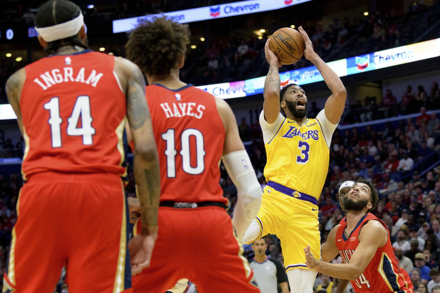 Lakers forward Anthony Davis (3) puts up a shot against the Pelicans during the first half of a game Nov. 27 at Smoothie King Center.