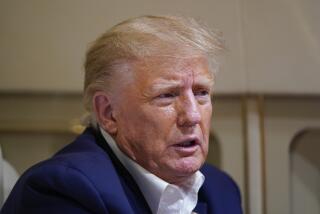 Former President Donald Trump speaks with reporters while in flight on his plane after a campaign rally at Waco Regional Airport, in Waco, Texas, Saturday, March 25, 2023, while en route to West Palm Beach, Fla. (AP Photo/Evan Vucci)