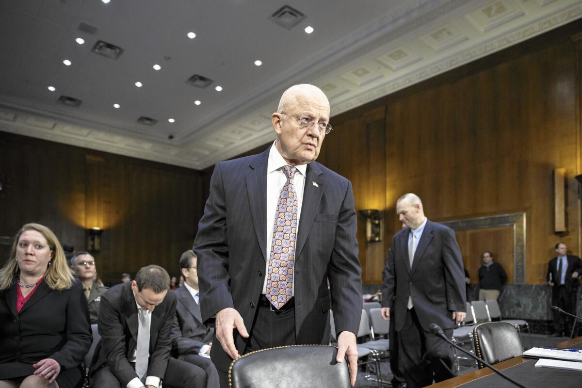 James R. Clapper, director of national intelligence, arrives for a Senate Armed Services Committee hearing Thursday.