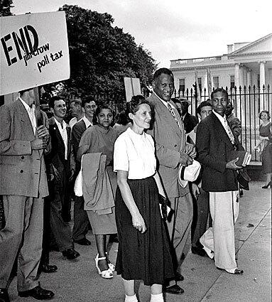 Paul Robeson, holding a white hat, leads civil rights activists down Pennsylvania Avenue in front of the White House on Aug. 5, 1948. Robeson, co-chairman of the Progressive Party, overcame discrimination to become a well-known singer, actor, lawyer and athlete.